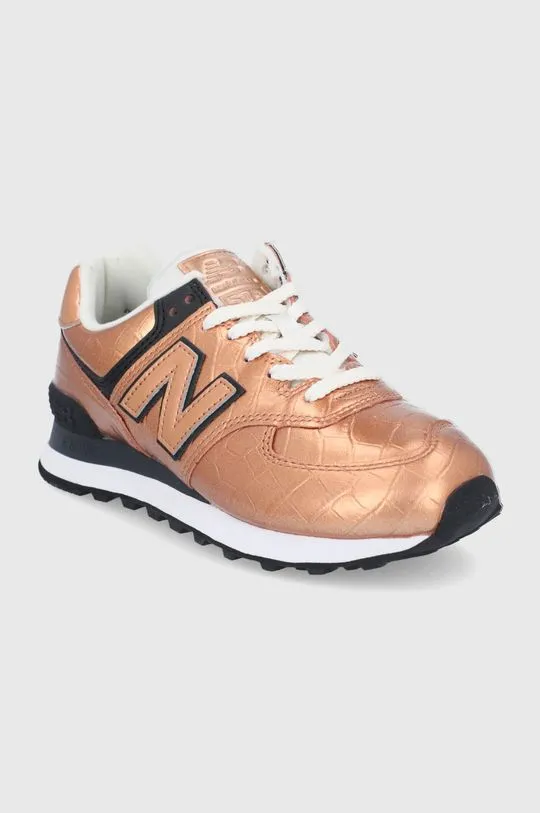 New Balance leather shoes WL574PX2 gold color