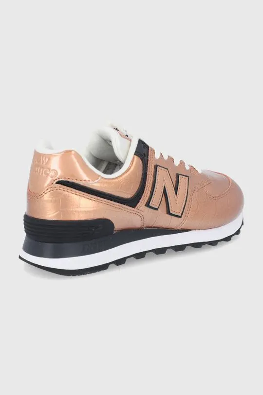 New Balance leather shoes WL574PX2 gold color